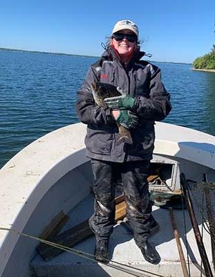 amanda holding a muskie